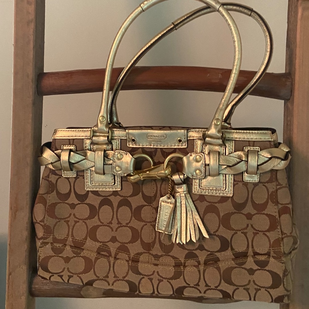 Cute gold and tan Coach purse